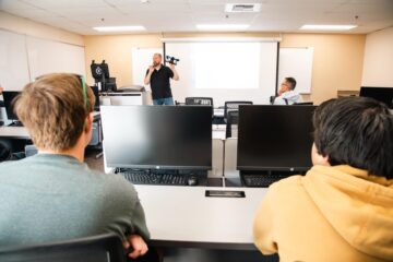 Jay Seidel, director of the Fullerton College Drone Technology Department, leads a lesson inside the Fullerton College Drone Lab. Through an expanded partnership, Brea Olinda High School students will gain access to college-level instruction and the opportunity to earn drone piloting certificates beginning in fall 2025.